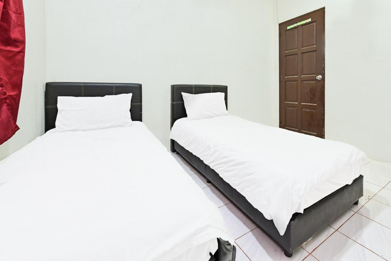 Oyo 90596 Casaria Inn Paka エクステリア 写真
