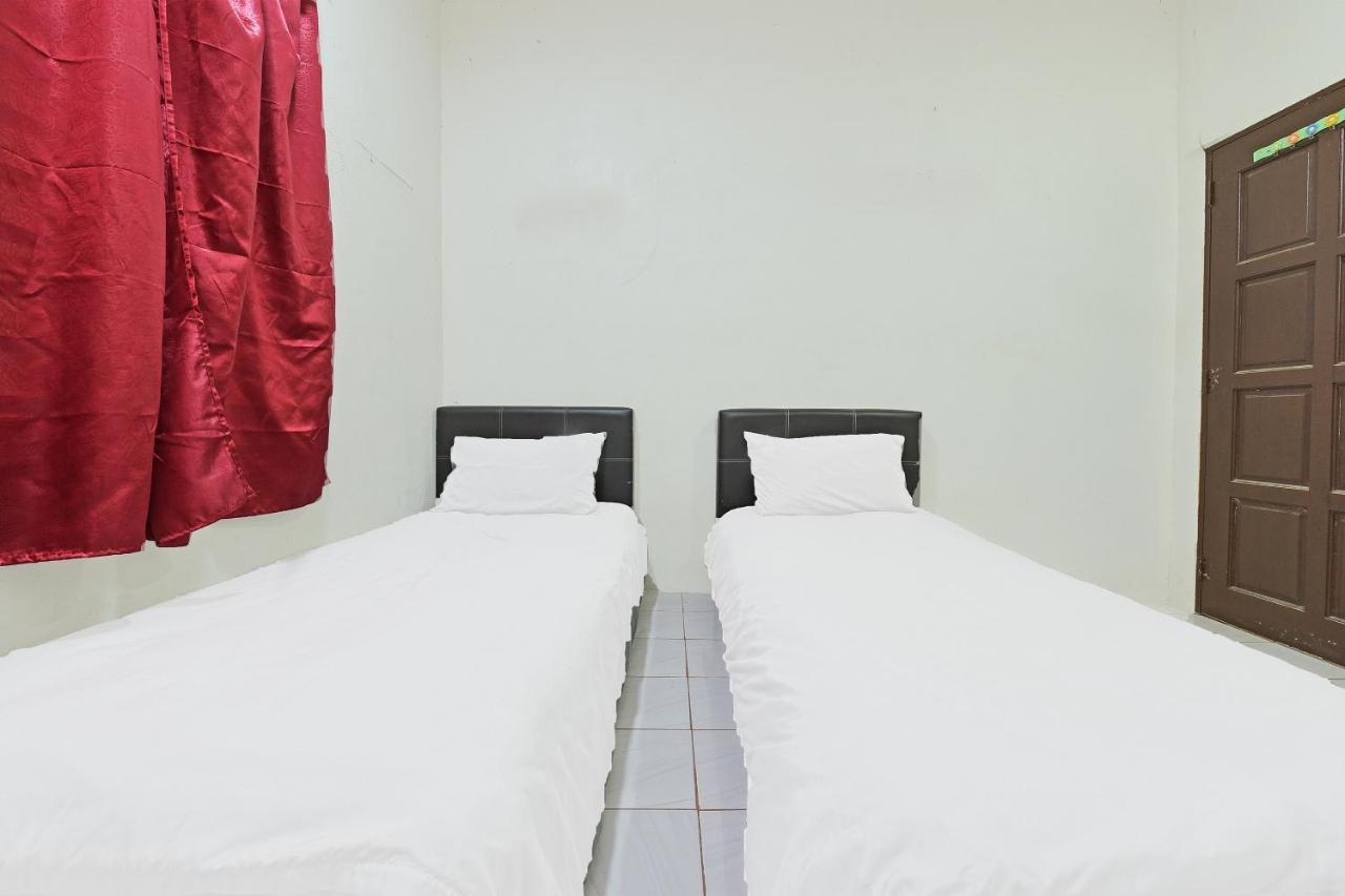 Oyo 90596 Casaria Inn Paka エクステリア 写真